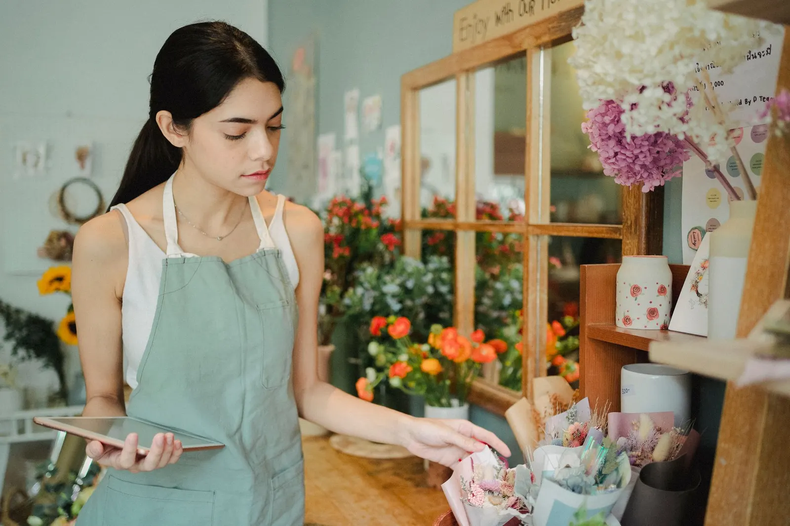 Small business owner using Claude Duet to automate administrative tasks